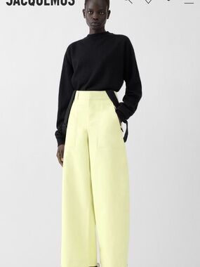 Jacquemus Black Sweater with Pale Yellow Wide-Leg Trousers